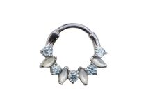 Steel hinge ring with white cabochon and light blue rhinestones | Itc