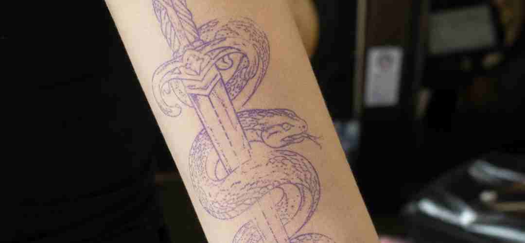 Tattoo stencil placed on the skin